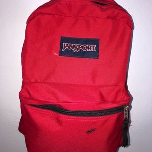 red jansport backpack